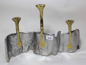 David Marshall, bi-metal three light candle holder in stylised form