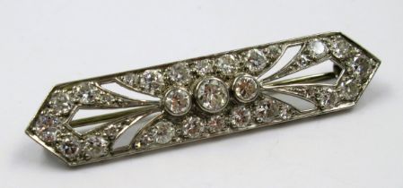 Unmarked high carat white metal and diamond set Art Deco bar brooch, 39mm wide