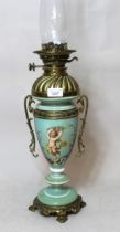 Victorian green opaque glass and gilt brass mounted oil lamp Good condition, no damage or