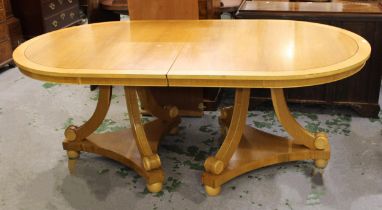 Mid to late 20th Century honey oak and sycamore crossbanded twin pedestal D-end dining table, raised