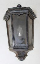 Set of four modern black painted metal lantern form wall lights, each approximately 40cm tall