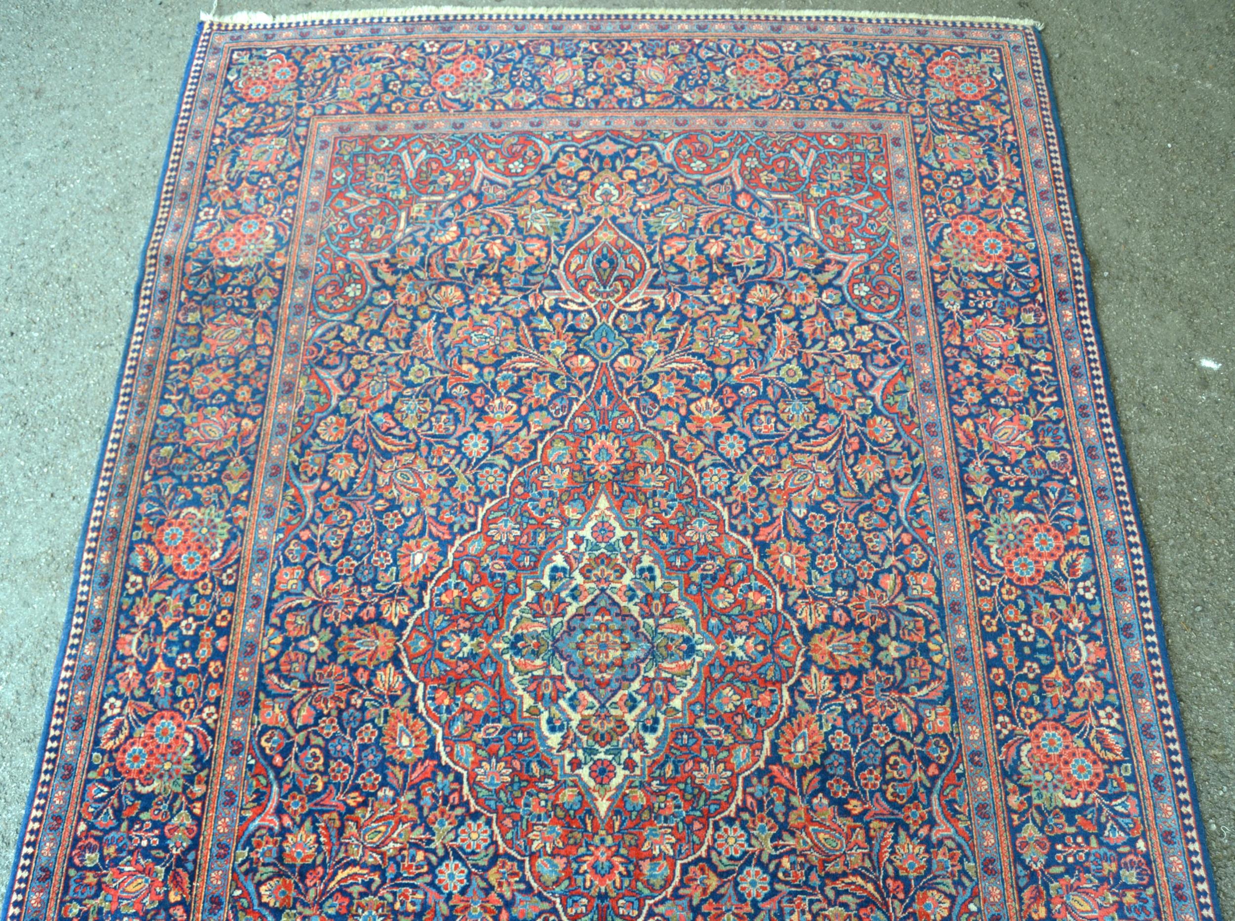 Kashan rug with a busy lobed medallion and floral design on a midnight blue ground with borders, 201 - Image 2 of 6