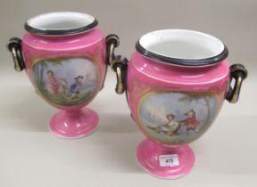 Pair of 19th Century Sevres style two handled baluster form vases with figural decoration in