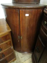 George III mahogany bow front hanging corner cabinet