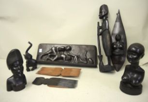 Box containing a quantity of African carved ebony and hardwood items including figural plaque,