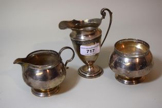 Birmingham silver cream jug and sugar basin, together with a similar pedestal cream jug, 8oz t