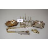 Silver toast rack, trinket dish, ashtray, swizzle stick, toothpick, pair of sugar tongs and a