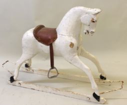Carved and painted rocking horse together with part of the original stand (for restoration), 112cm