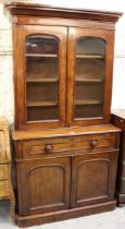 Victorian mahogany secretaire bookcase, the moulded cornice above a pair of glazed doors enclosing