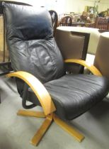 Modern black leatherette and laminate swivel lounge chair