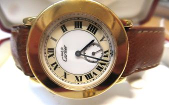 Must de Cartier, ladies silver gilt wristwatch, the circular 33mm case with Roman numerals and
