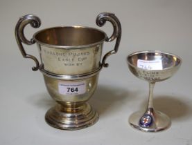 Birmingham silver two handled trophy cup, engraved Shillong Pujahs and another pedestal trophy cup
