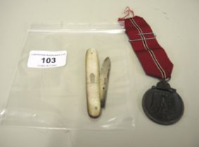 World War II German Third Reich Eastern Front medal (Winterschlecht Imosten 1941/42) with ribbon,