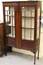Edwardian mahogany and line inlaid display cabinet with two bar glazed and panel doors enclosing