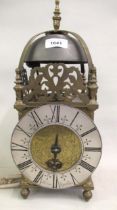 19th Century brass lantern clock, the silvered dial with Roman numerals and indistinct signature,