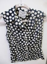 Arabella Pollen, London, waistcoat style halterneck top, another polka dot sleeveless blouse, both