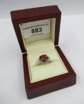 Platinum ring set central tourmaline with baguette diamond set shoulders, size K, in wooden ring box