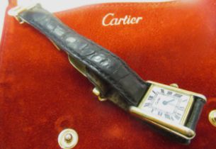 Must de Cartier ladies silver gilt tank silver wristwatch, the white dial with Roman numerals, on