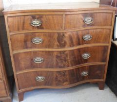 Early 19th Century mahogany serpentine chest with two short and three long graduated drawers, on