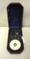 Mid 20th Century Smiths tachometer in original fitted case, together with a vintage fire
