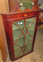 George III mahogany and line inlaid hanging corner cabinet, the swan neck pediment above a bar