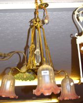 Early 20th Century brass three light electrolier of Art Nouveau design with pink and frosted glass
