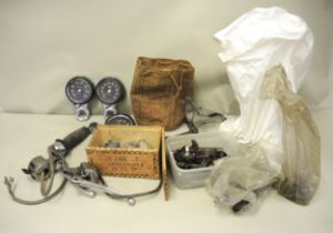 Quantity of motorcycle parts including four speedometers, gear box parts and side stands