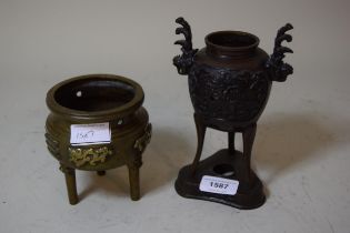 Chinese bronze censer, together with a Japanese patinated bronze censer Taller censer in good