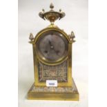 19th Century French gilt brass mantel clock with urn surmount, the two train movement striking on