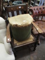 20th Century oak slatted open armchair with drop-in rush seat and a small Lloyd Loom linen basket (