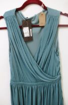 Gucci, sleeveless wrap style dress having original tags, size L