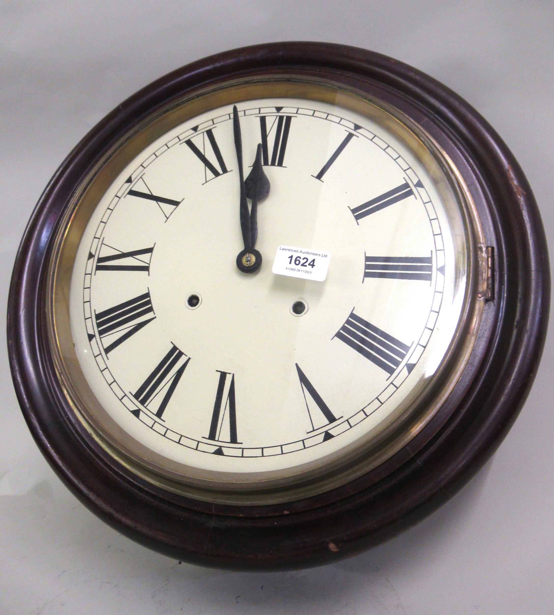 Late 19th / early 20th Century circular wall clock with a stained moulded case, painted dial,