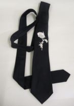 Alexander McQueen, black tie with rose embroidered decoration Some staining to white flowers, also