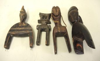 Group of four African tribal Heddle Pulleys (Senufo Guro Djimini)