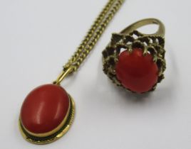 Oval coral pendant (loop marked 750) on a 9ct gold chain, 5.4g, together with a 9ct gold coral set