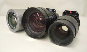 Two large Epson camera lenses together with another similar