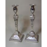 Pair of Victorian silver Adam style candlesticks of square knopped baluster form, Sheffield 1884,