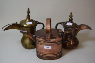 19th Century copper water can, together with two Middle Eastern jugs
