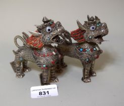 Pair of oriental white metal filigree work figures of dogs of foe mounted with turquoise and