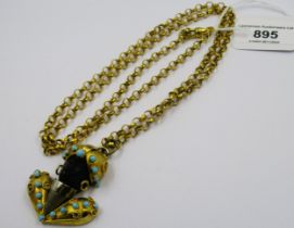 Gold plated blackamoor pendant set turquoise on a gold plated chain