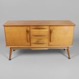 A MID CENTURY TEAK SIDEBOARD & DINING TABLE - HANDCRAFT.