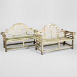 A PAIR OF WEATHERED TEAK LUTYENS STYLE BENCHES.
