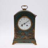 A FRENCH CHINOISERIE LACQUERED MANTEL CLOCK.