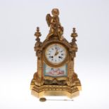 A 19TH FRENCH PORCELAIN MOUNTED MANTEL CLOCK.
