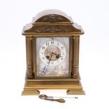 A FRENCH GILT AND ENAMELLED MANTEL CLOCK.