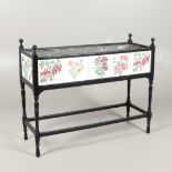 AN ARTS AND CRAFTS EBONISED AND TILED JARDINIERE STAND.