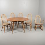 ERCOL DROP FLAP TABLE & FOUR DINING CHAIRS, & A ROCKING CHAIR.