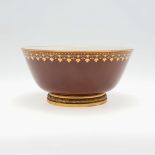 A SEVRES PORCELAIN BOWL ON GILT METAL BASE - PARIS RETAILER 'RISLER & CARRE'.