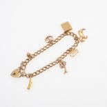 A 9CT GOLD CURB LINK BRACELET.