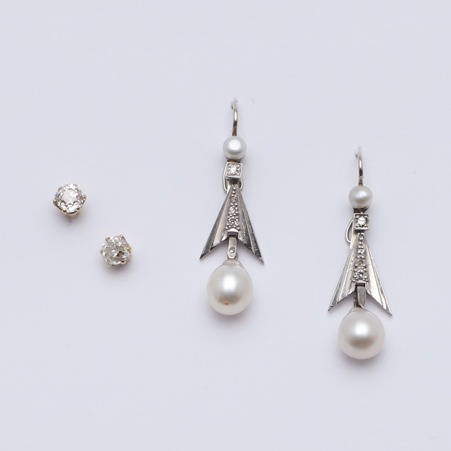 A PAIR OF DIAMOND AND CULTURED PEARL DROP EARRINGS.
